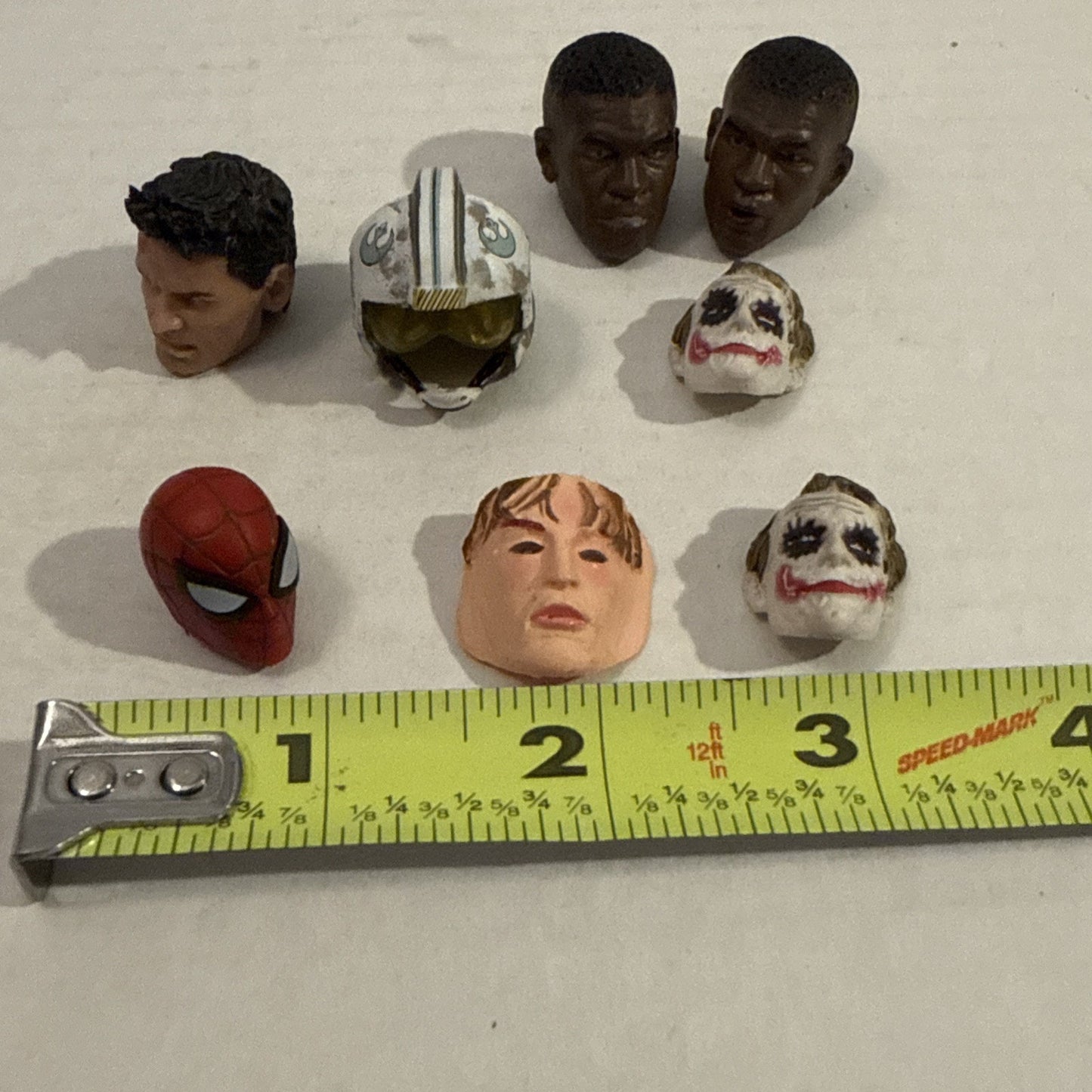 Lot Of Toy Action Figure Heads & Masks - Spider-Man, Mike Tyson, Joker, Drake