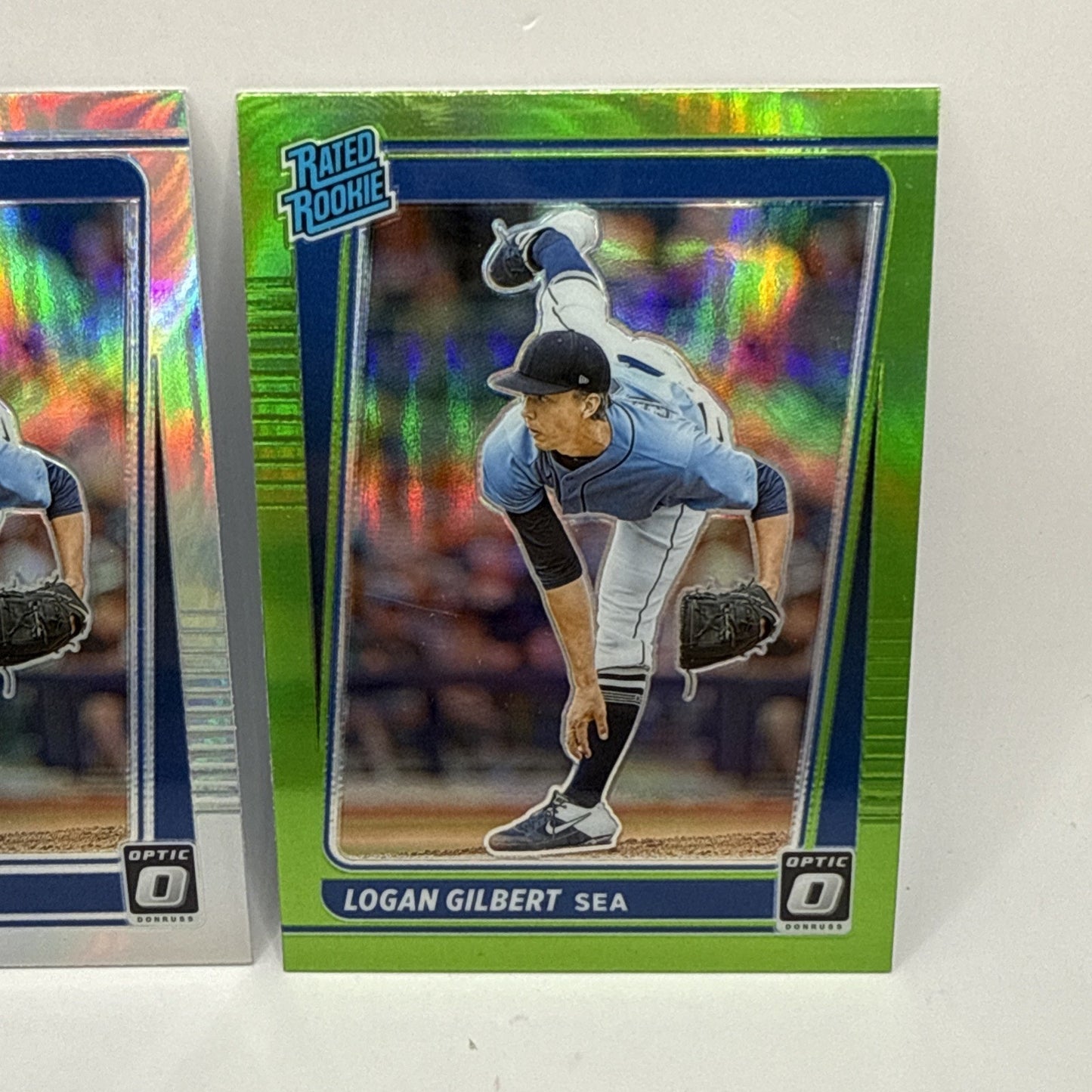 2021 Panini Optic Baseball Logan Gilbert Rated Rookie Silver & Green Holo Prizm