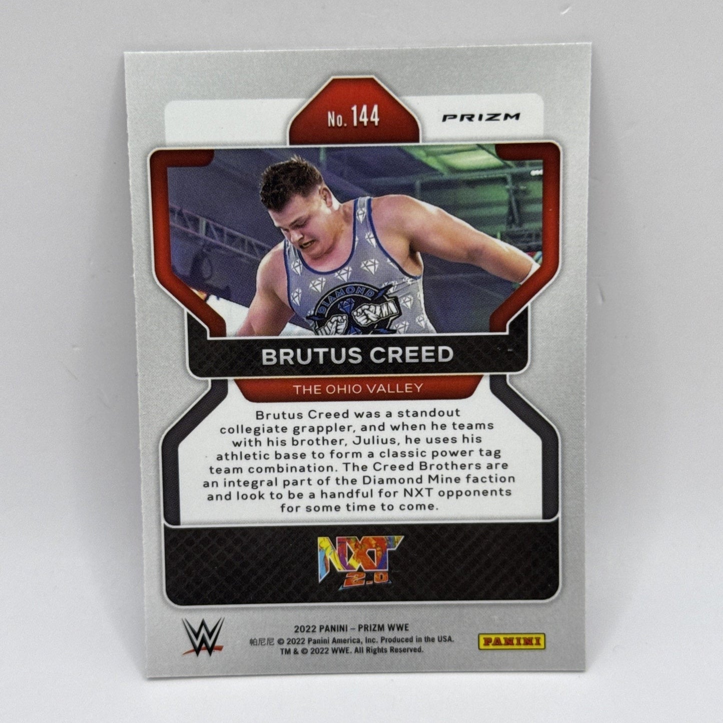 2022 Panini Prizm WWE WRESTLING CRACKED ICE ATOMIC BRUTUS CREED #144