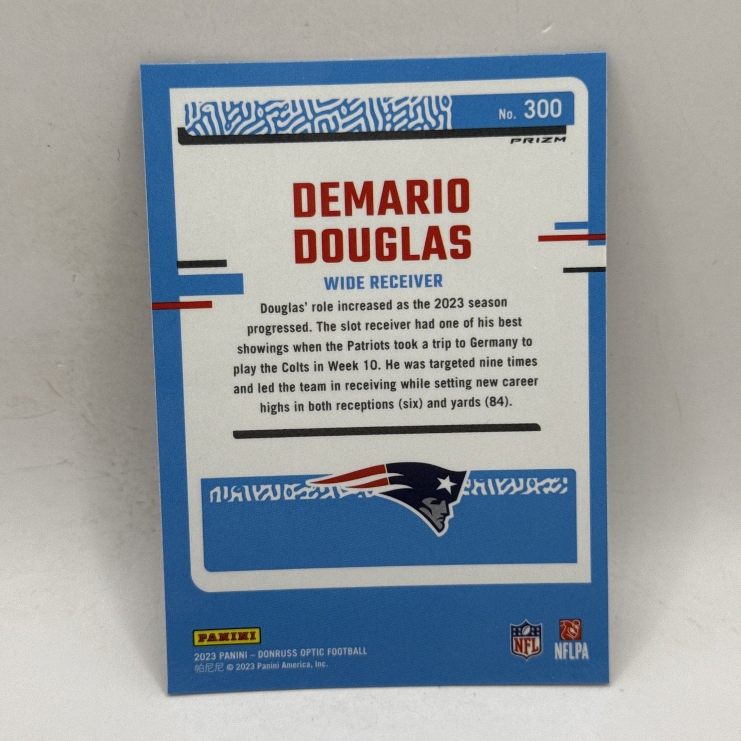 2023 Donruss Optic Demario Pop Douglas Purple Shock Rated Rookie Patriots RC
