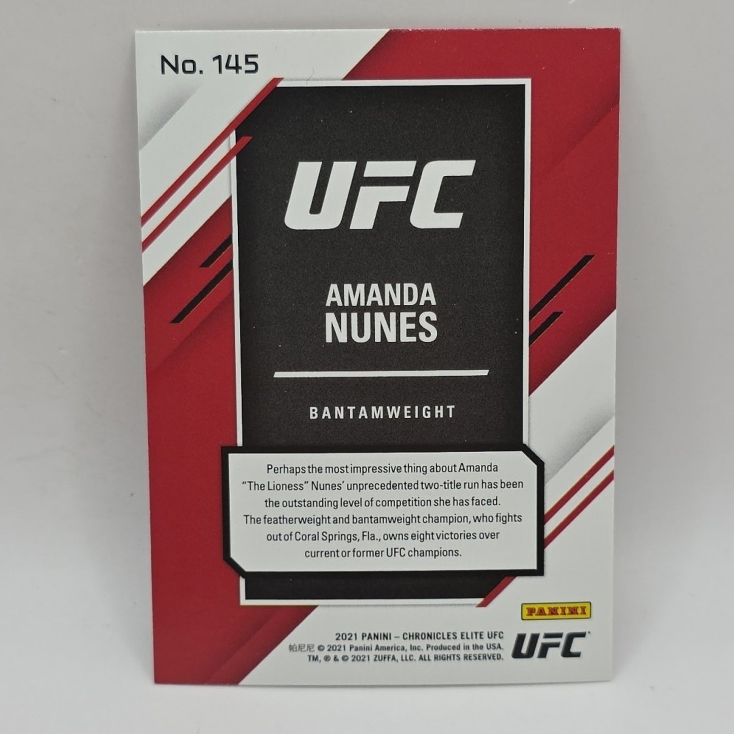 2021 Panini Chronicles UFC #145 Amanda Nunes Pink MMA Fighter Trading Card