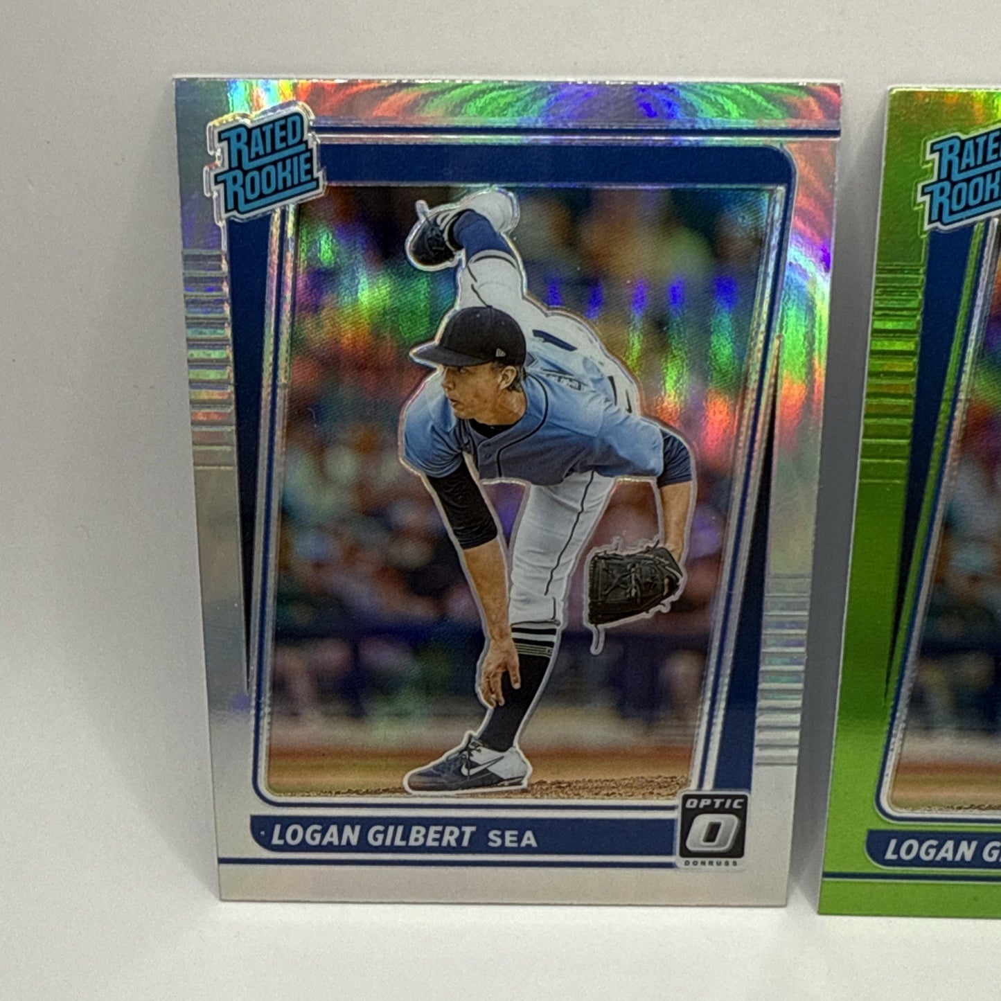 2021 Panini Optic Baseball Logan Gilbert Rated Rookie Silver & Green Holo Prizm