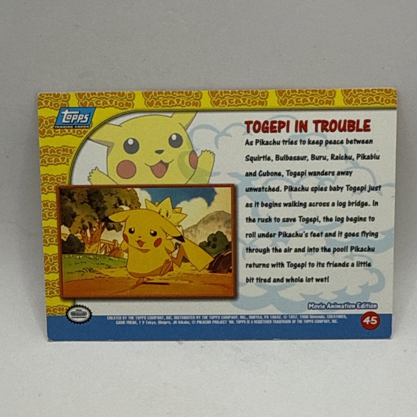 Togepi In Trouble 45 Pikachu's Vacation TOPPS Pokemon the First Movie Blue Logo