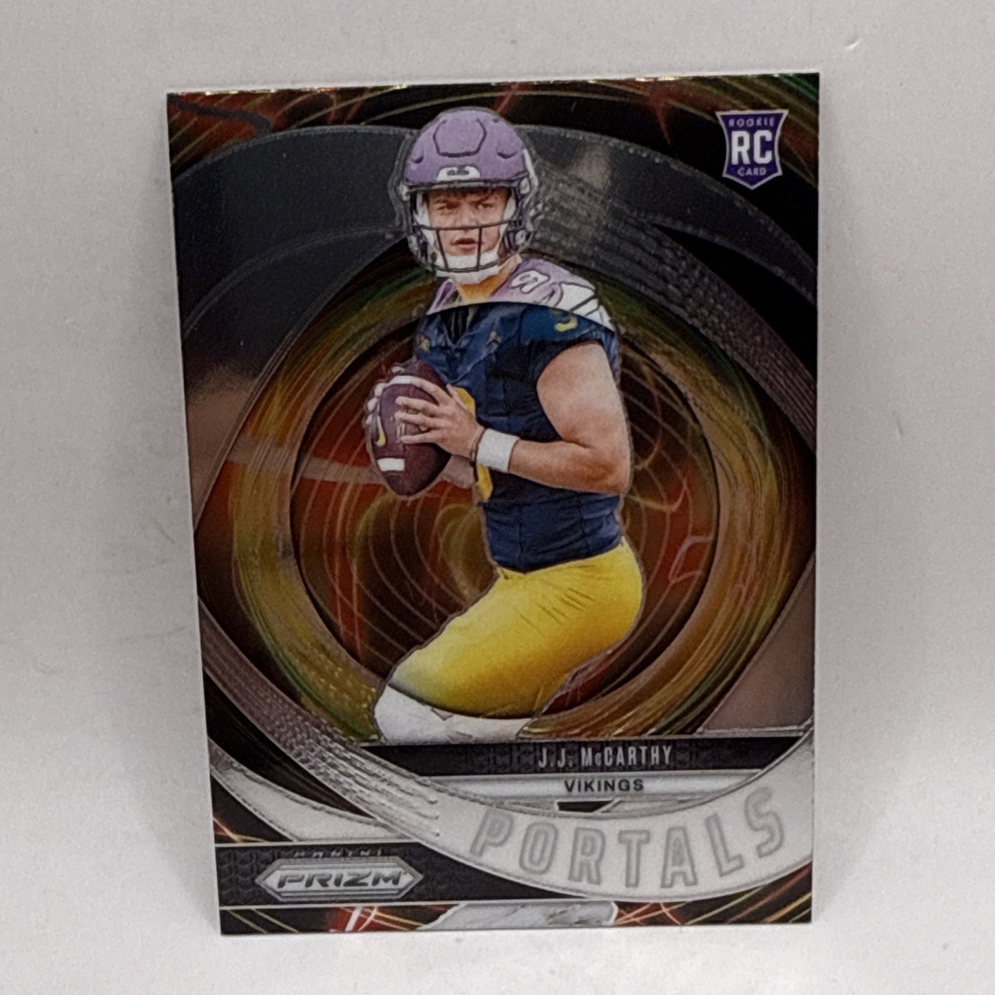 2024 Panini Prizm - Portals #7 J.J. McCarthy (RC) Vikings Rookie NFL Card