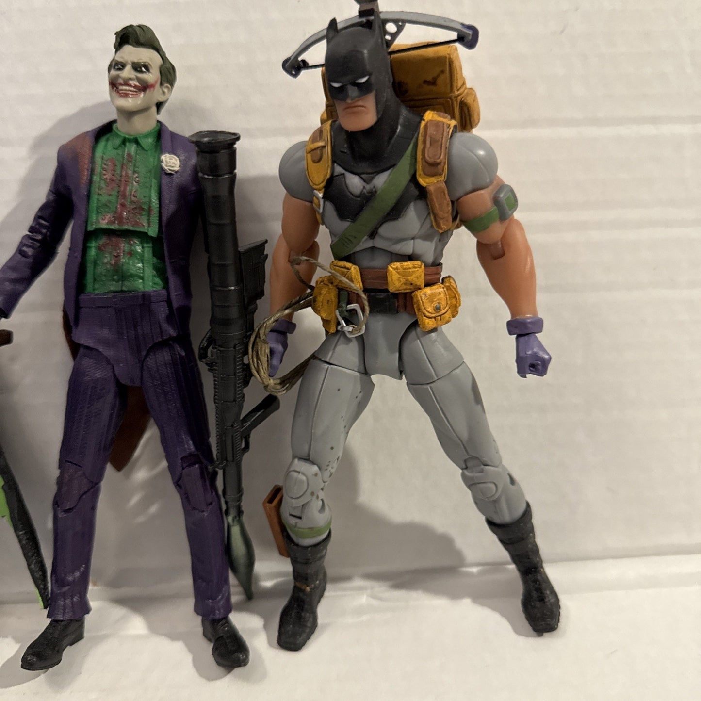 DC Multiverse Batman & Joker Toy Action Figure Lot + Random Weapon Accessories