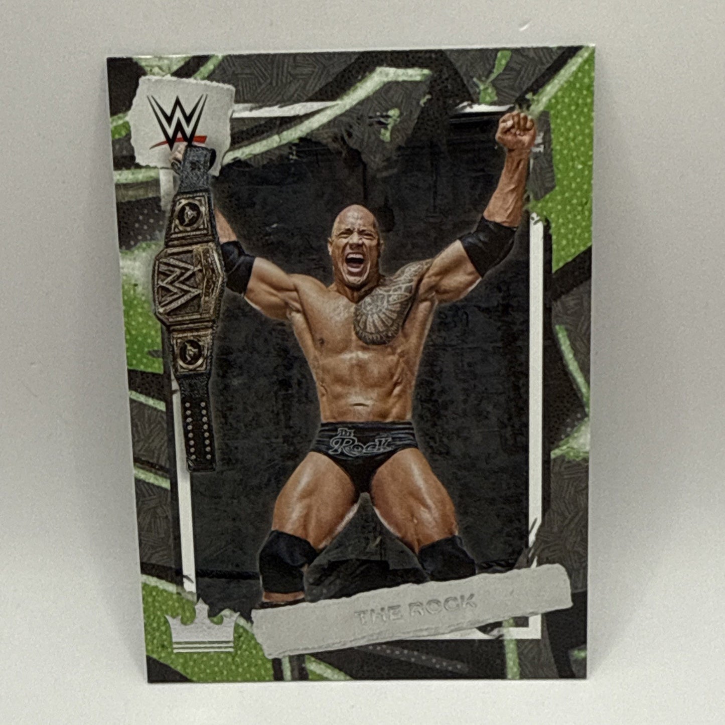 2023 Panini Chronicles Ring Royalty WWE 117 The Rock Bronze Parallel B-19
