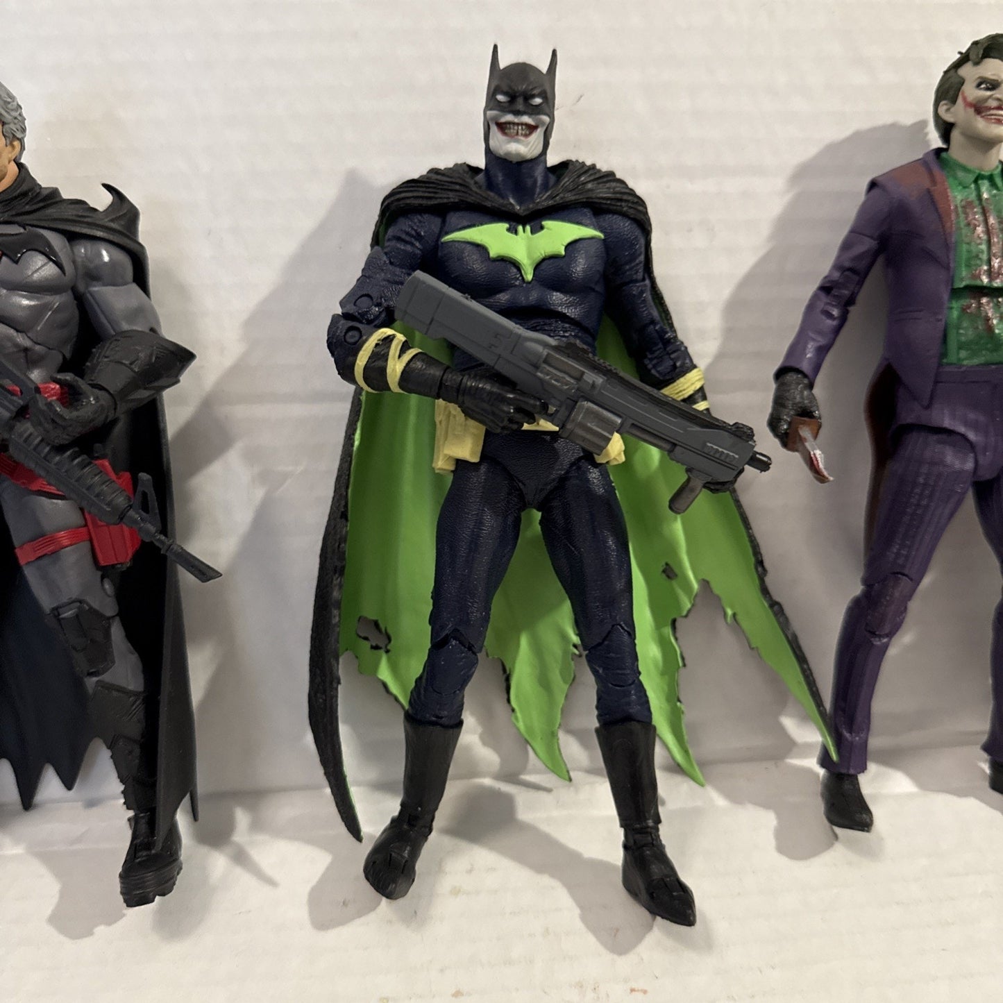 DC Multiverse Batman & Joker Toy Action Figure Lot + Random Weapon Accessories
