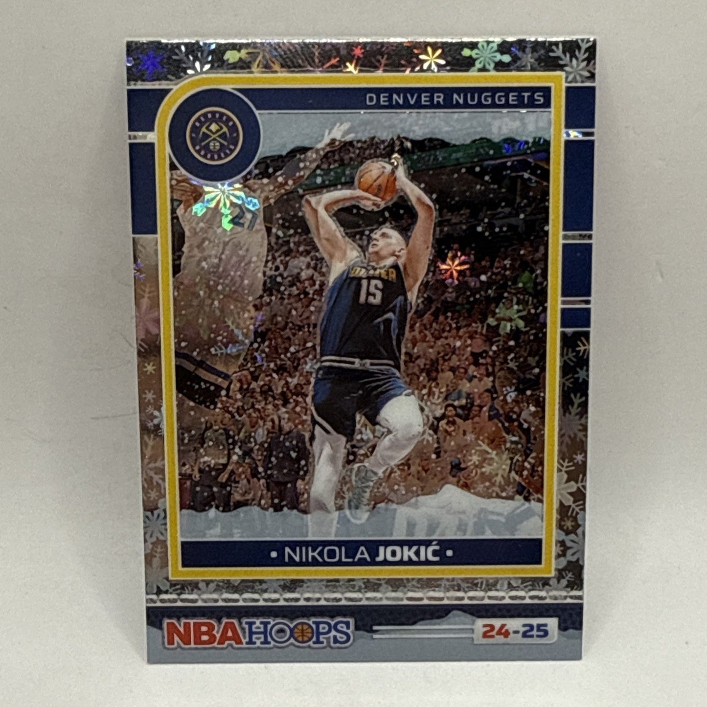 2024-25 NBA Hoops Nikola Jokic Silver Snowflake Prizm #12 Denver Nuggets