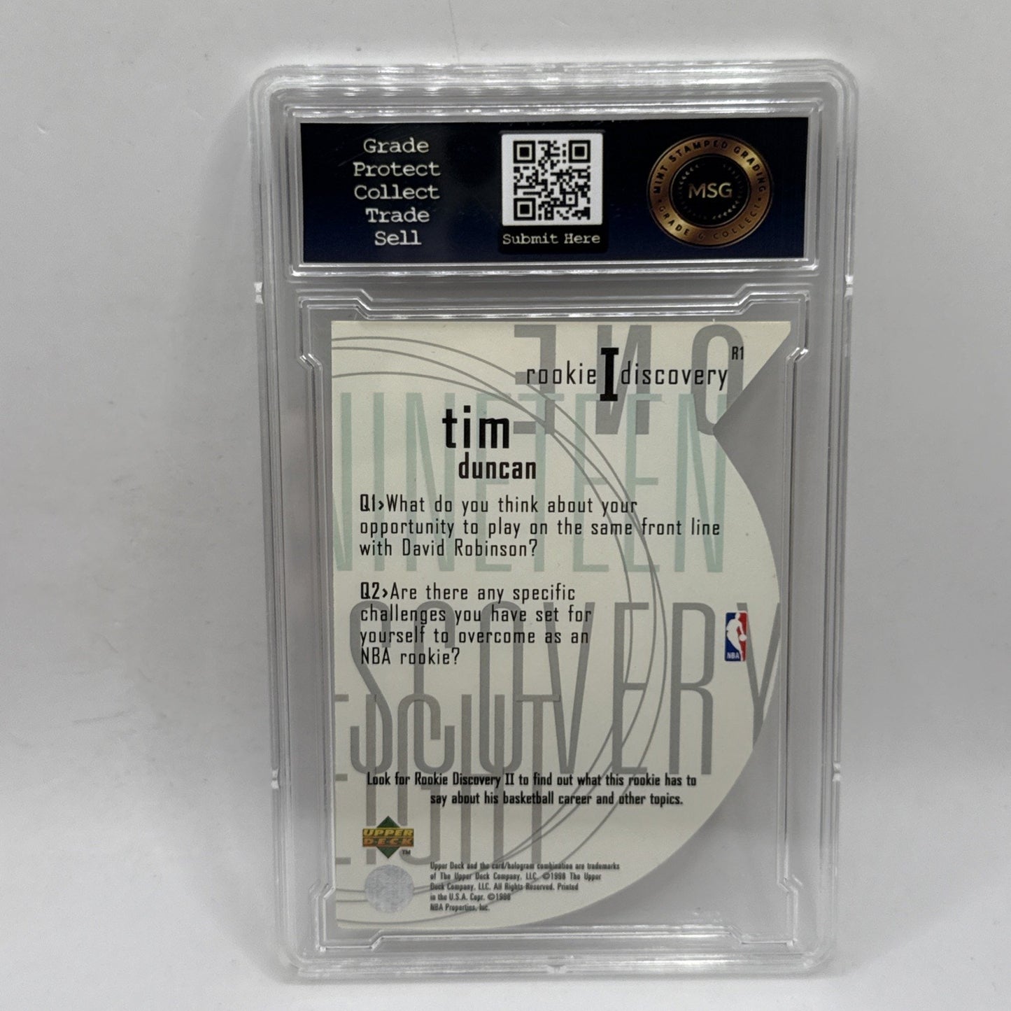 1997 Upper Deck Tim Duncan Rookie Discovery RC #R1 Graded 7 NBA Spurs