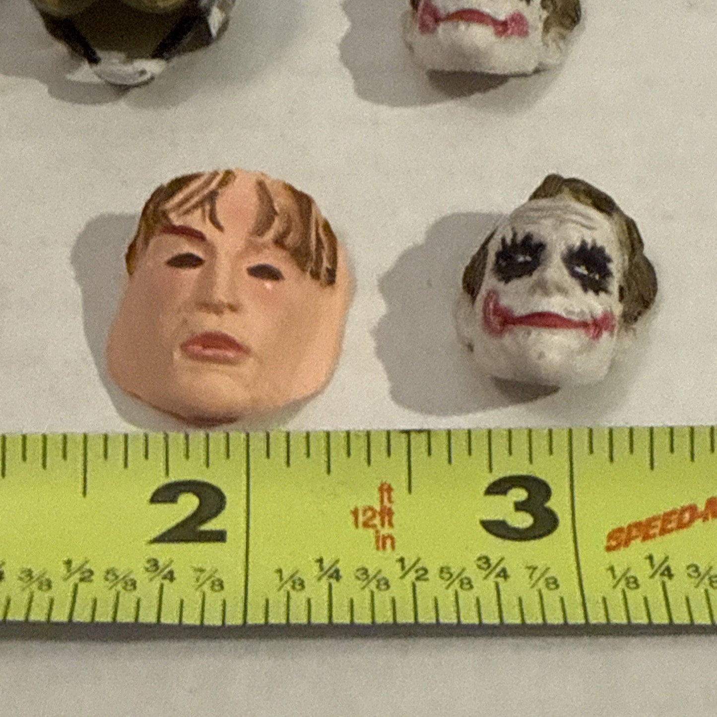 Lot Of Toy Action Figure Heads & Masks - Spider-Man, Mike Tyson, Joker, Drake