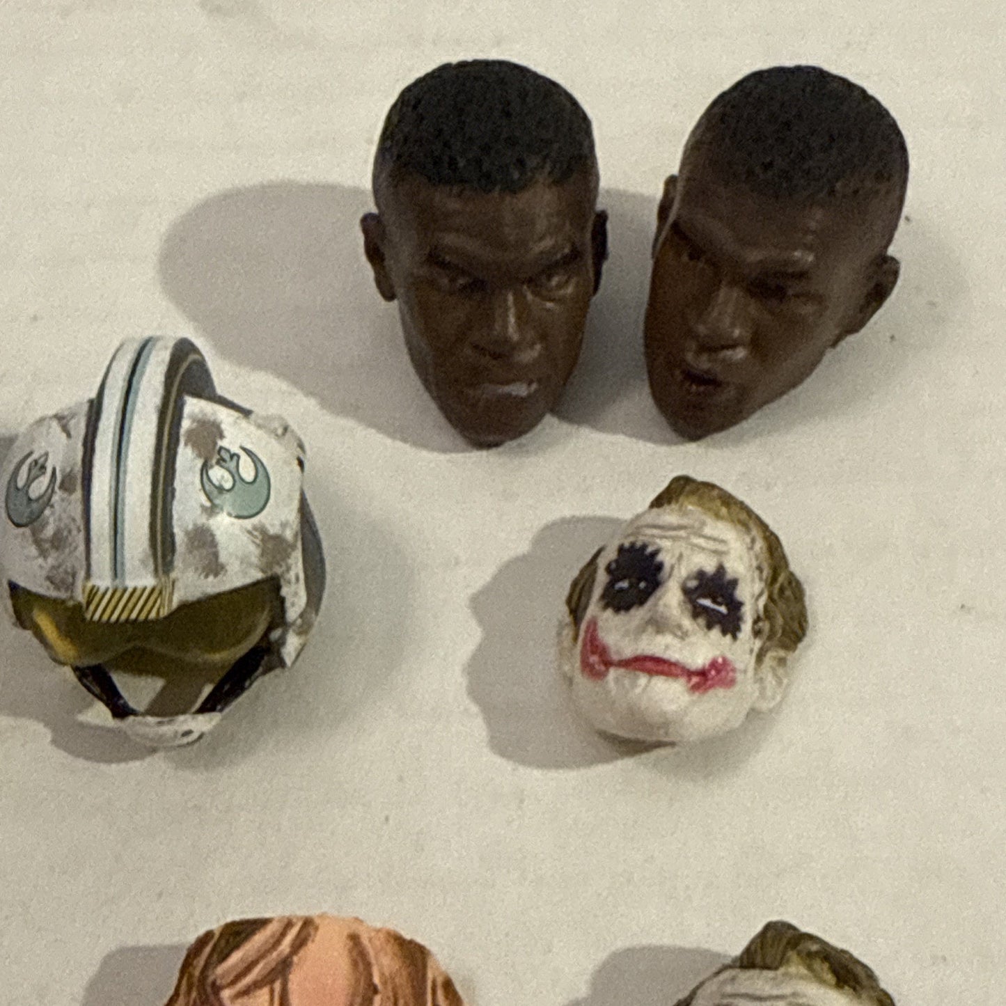 Lot Of Toy Action Figure Heads & Masks - Spider-Man, Mike Tyson, Joker, Drake