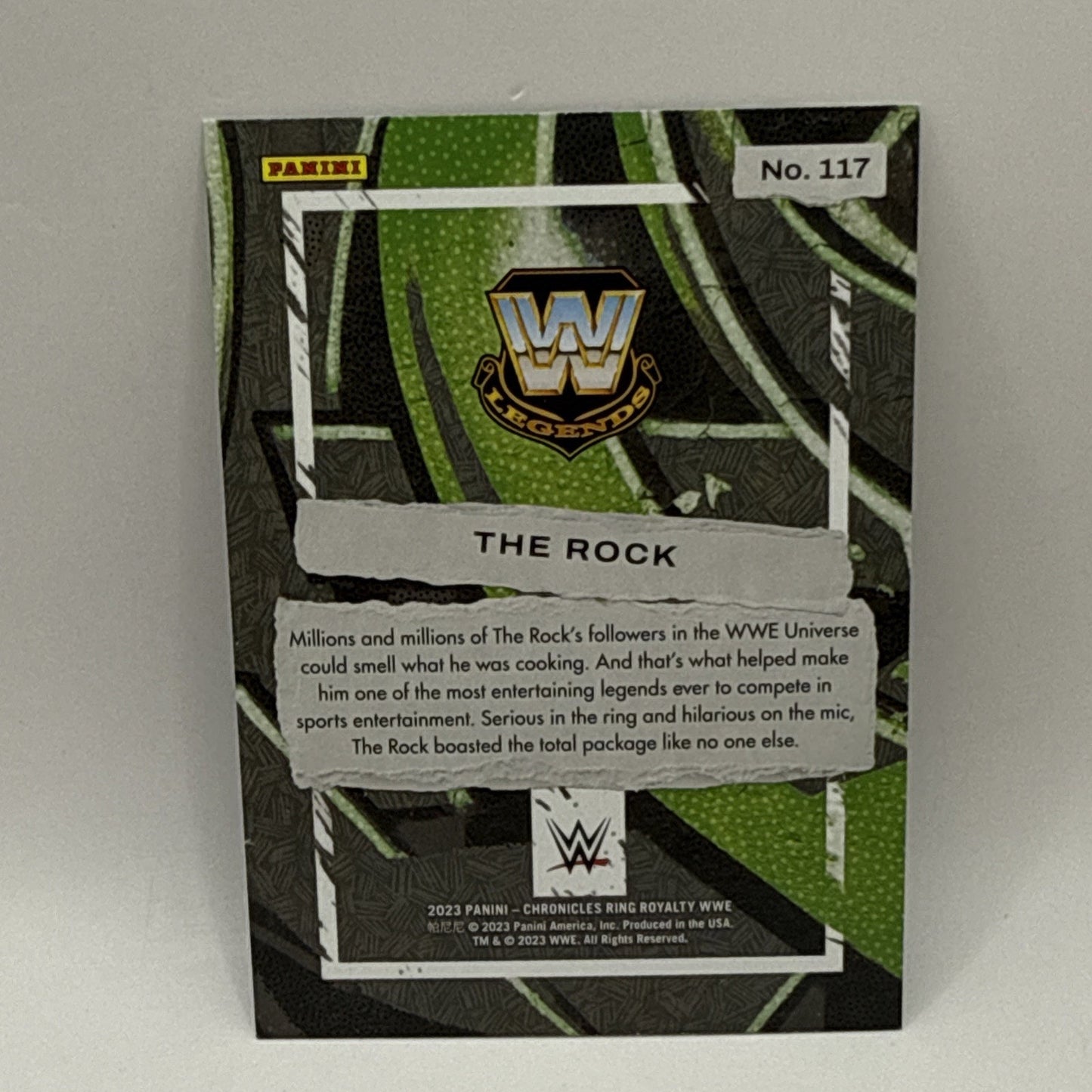 2023 Panini Chronicles Ring Royalty WWE 117 The Rock Bronze Parallel B-19